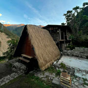 view of the andean huts and their stone walkway